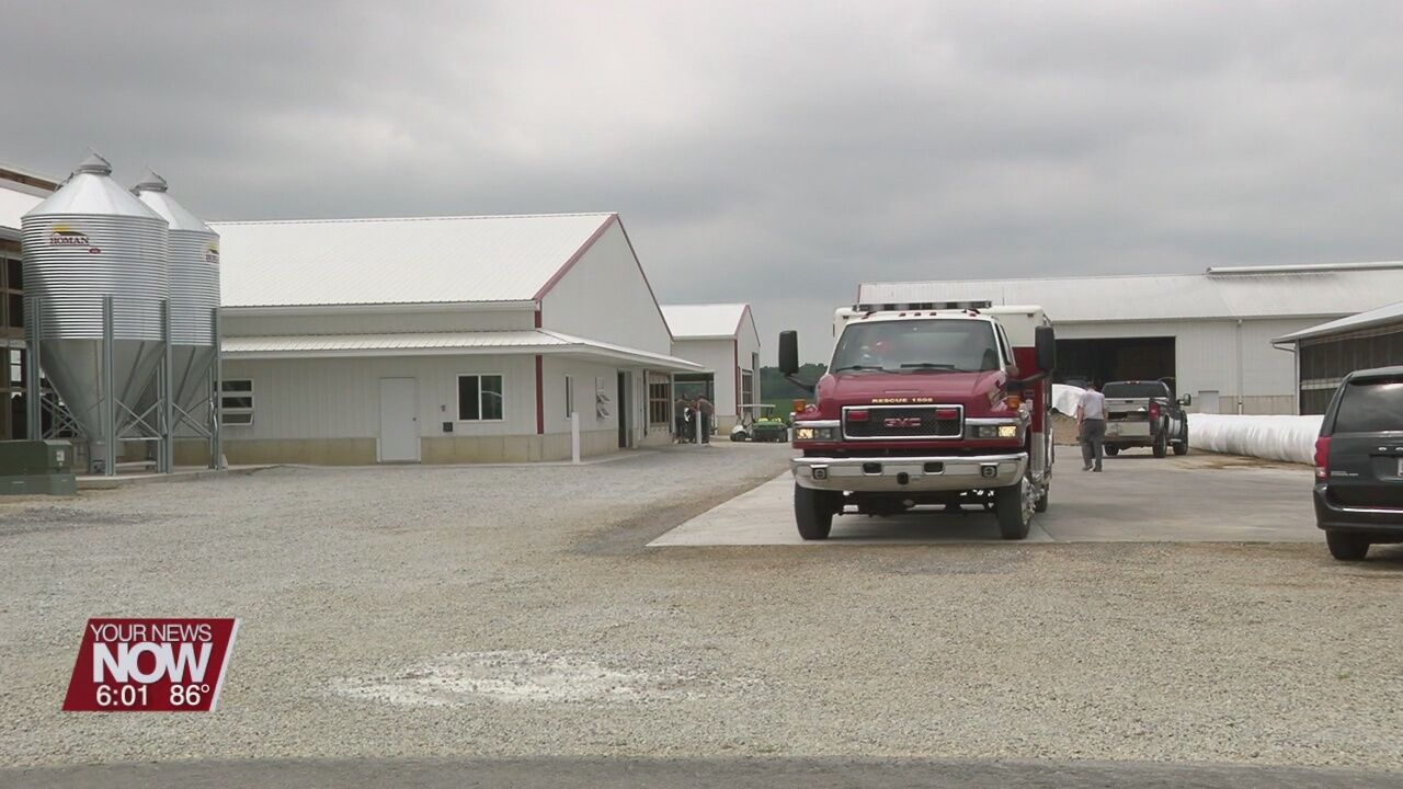 Three hospitalized after becoming trapped in manure pit
